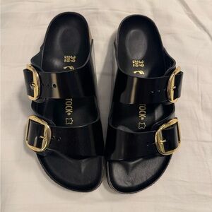 Birkenstock Black Sandals with Gold Buckles